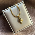 Halskette mit Pilzanhänger Gold