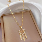 Halskette mit Traumfänger-Herzanhänger aus Kristall