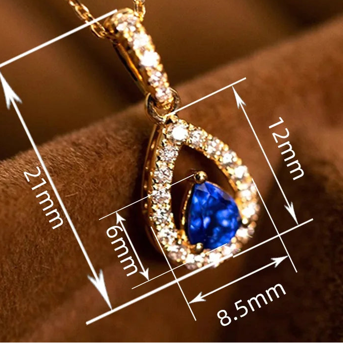 Collana con pendente doppia goccia d'acqua e cristallo blu zaffiro