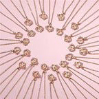 Kette mit Herz- und Blumen-Anhänger mit Initiale