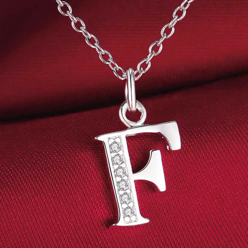 Lange Halskette mit Initialenanhänger f