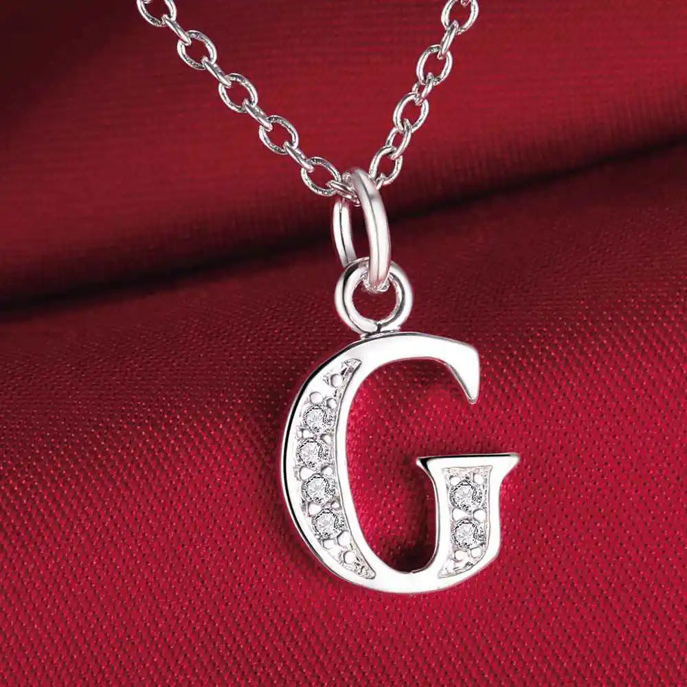 Lange Halskette mit Initialenanhänger g