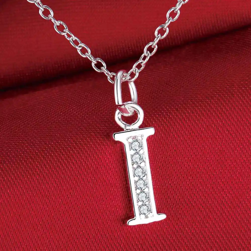 Lange Halskette mit Initialenanhänger i