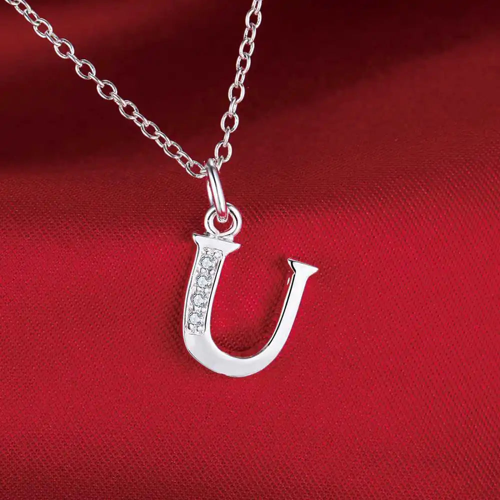 Lange Halskette mit Initialenanhänger u
