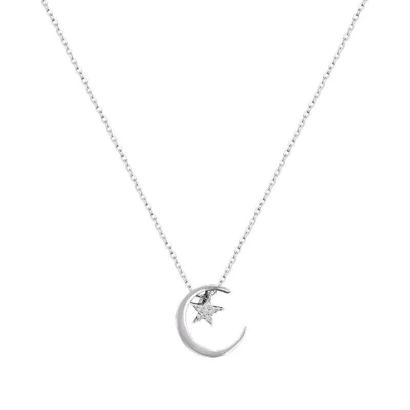 Halskette mit Mond- und Sternanhänger aus Kristall