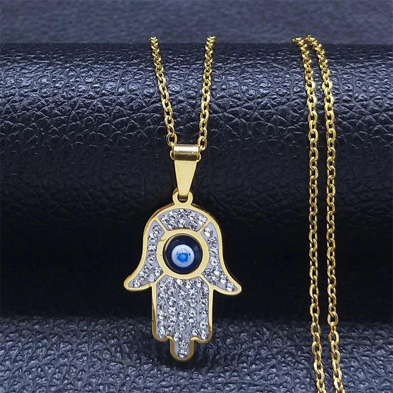 Lange Halskette mit Anhänger zum Schutz vor dem bösen <span data-glossary-id="œil">Auge</span> und arabischer Fatma-Hand in Gold