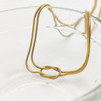Halskette mit minimalistischem Knoten-Anhänger gold