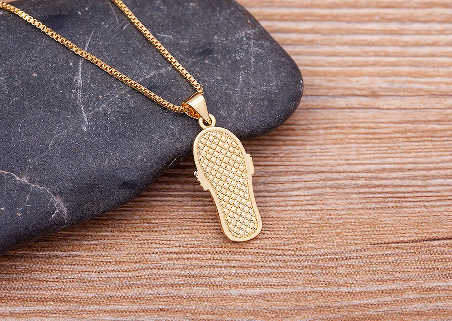 Halskette mit Zungenanhänger, blauem Auge und Zirkon