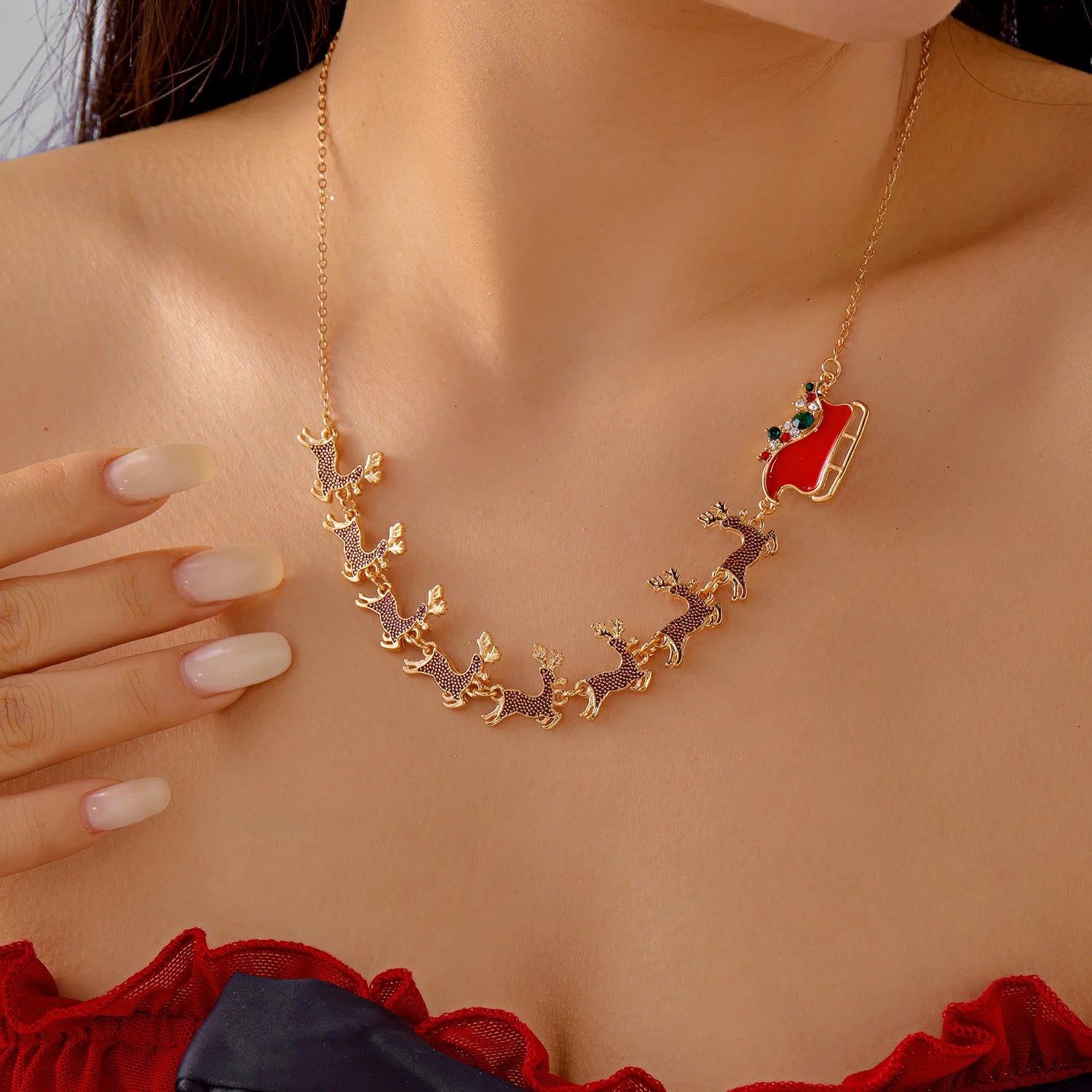 Halskette mit Weihnachtsanhänger Traîneau