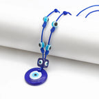Kordelkette mit großem blauem Augenanhänger