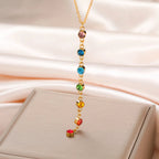 Schutzkette mit langem Anhänger aus 7 Chakra-Steinen gold