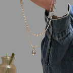 Doppelhalskette mit Wassertropfen-Anhänger