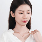 Doppelhalskette mit Unendlichkeitsanhänger und Zirkonia in Roségold