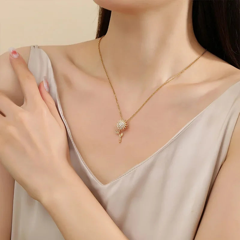 Elegante Halskette mit langem Sonnenblumenanhänger