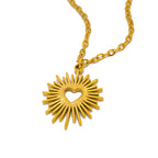 Collier motif soleil éclatant et cœur central or