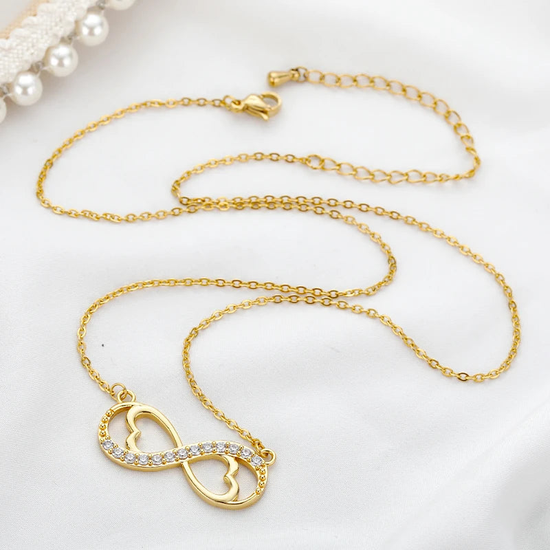 Halskette mit Anhänger Unendlichkeit Herz und Zirkonia Gold