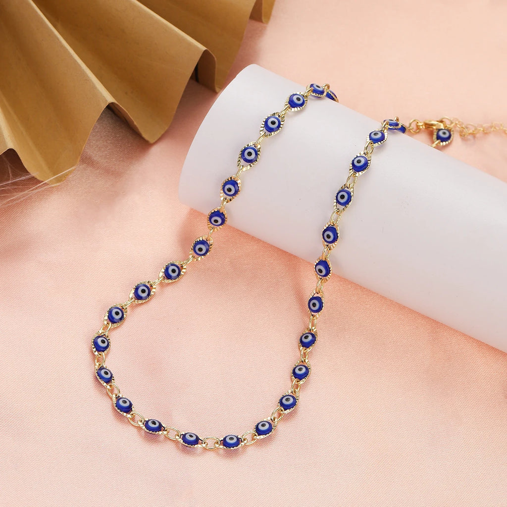 Birden fazla koyu mavi nazar boncuğu uçlu choker kolye