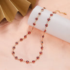 Birden fazla koyu kırmızı nazar boncuğu uçlu choker kolye