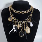 Choker mit Anhängern aus Korallen und Muscheln