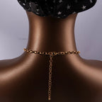 Choker mit Anhängern aus Koralle und Muscheln