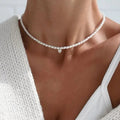 Choker mit Anhänger aus weißer Perle und Herz
