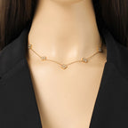 Choker mit Anhängern in Form eines vierblättrigen Kleeblatts