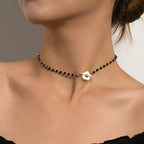 Halskette Choker Anhänger Blume schwarz und gold