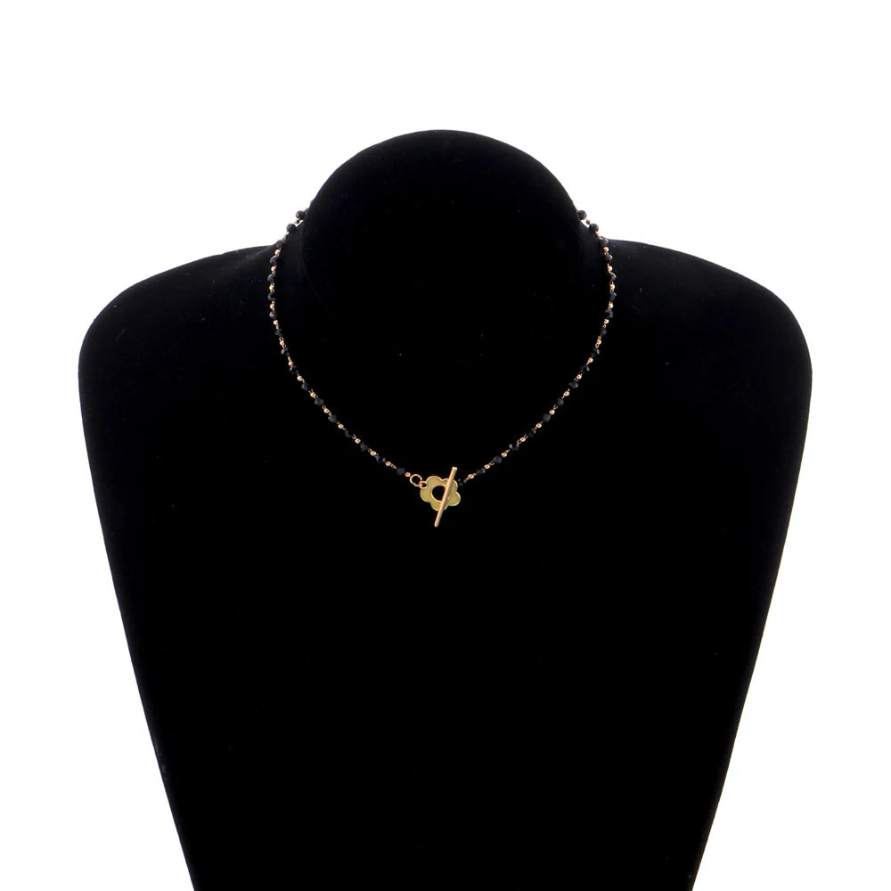 Halskette Choker Anhänger Blume schwarz und gold