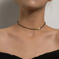 Halskette Choker Anhänger Blume schwarz und gold