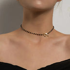 Halskette Choker Anhänger Blume schwarz und gold