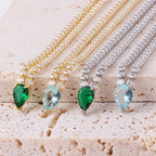 Charmante Halskette mit Wassertröpfchen-Anhänger und Zirkonia in Gold und Blau