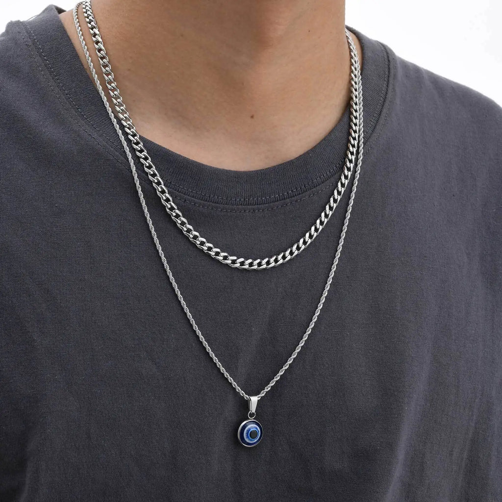 Collana ritorta con discreto pendente occhio blu argento