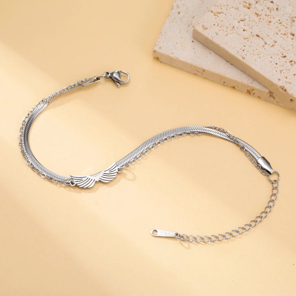 Doppelarmband mit silbernen Engelsflügeln