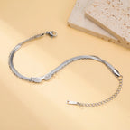 Doppelarmband mit silbernen Engelsflügeln