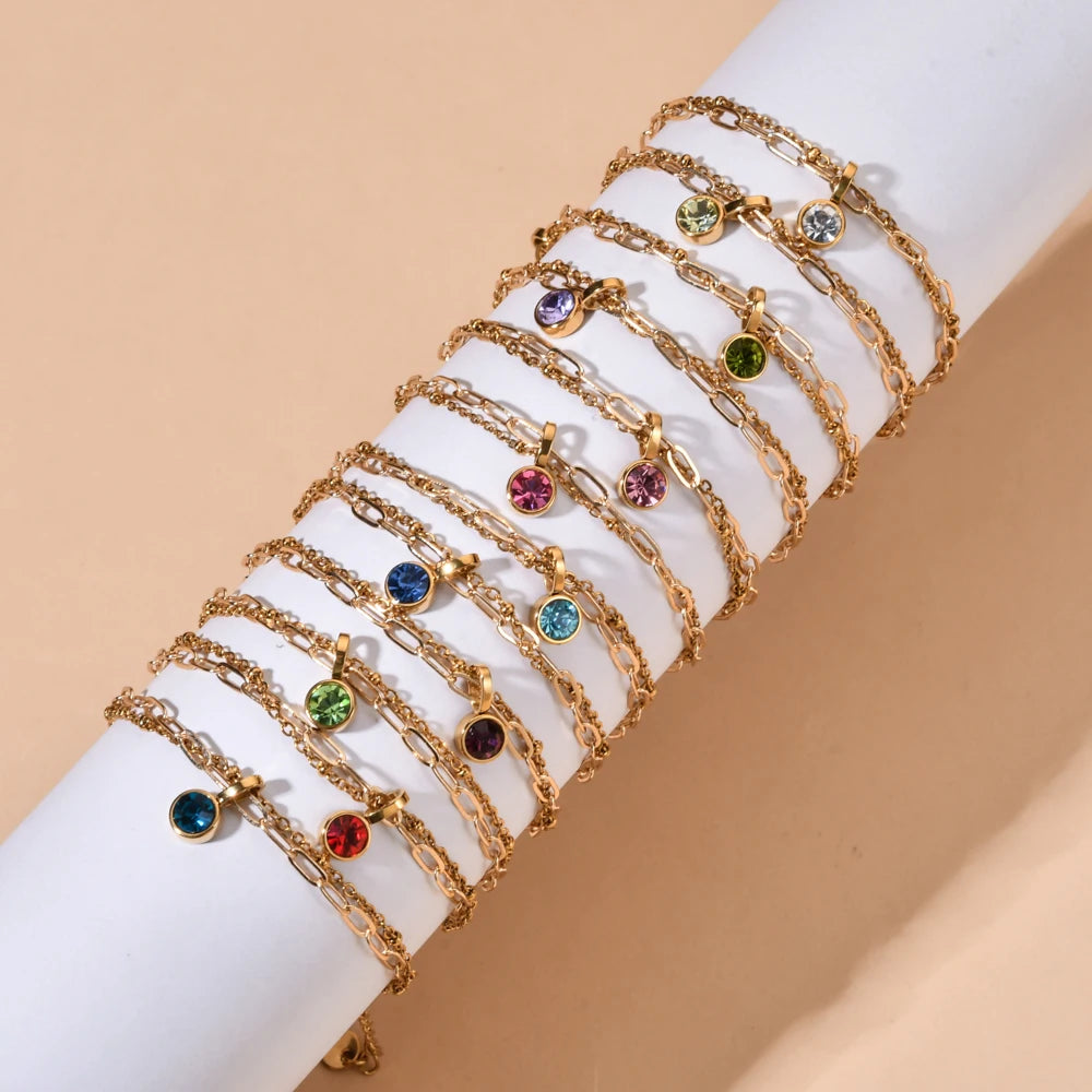 Doppeltes vergoldetes Armband mit Geburtsstein Januar
