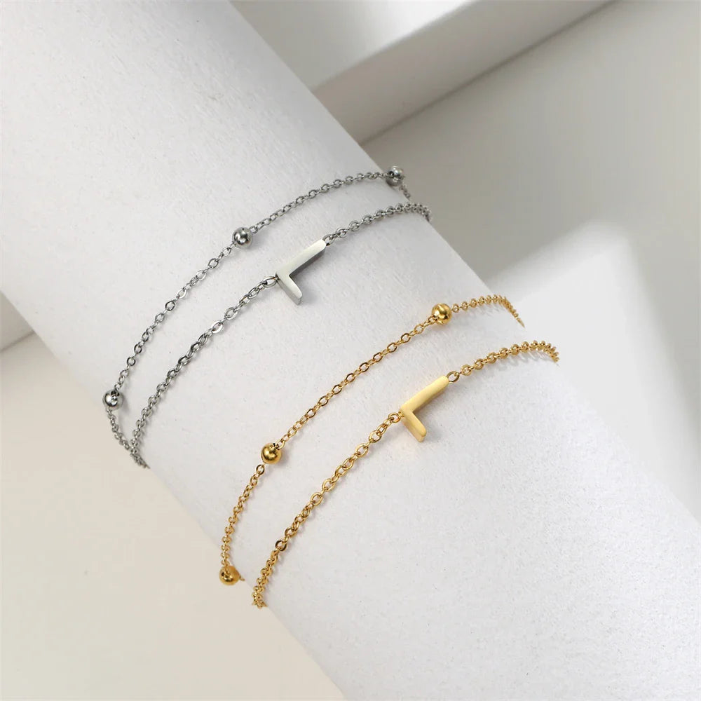 Armband mit doppelter Initiale in Gold und Silber l