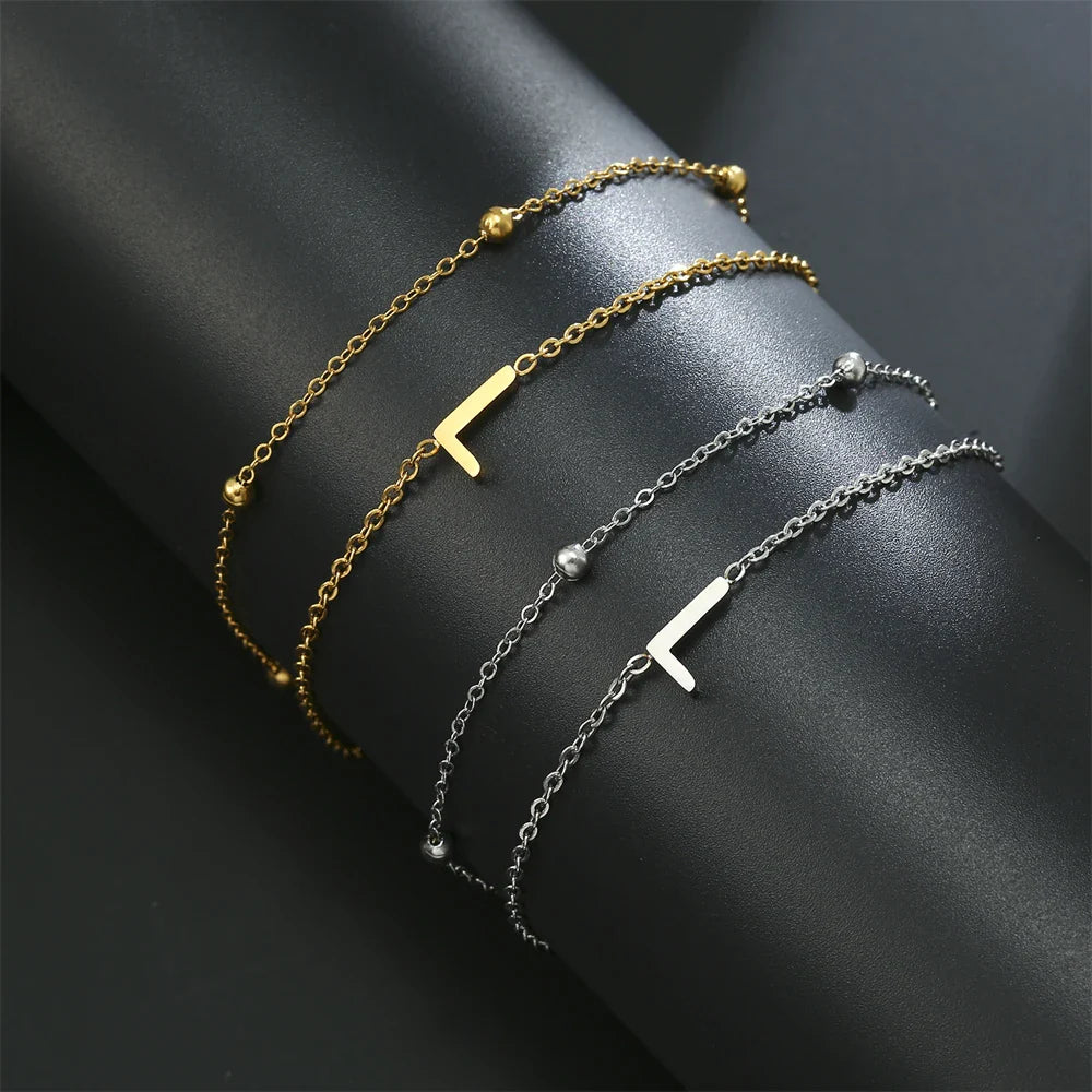 Armband mit doppelter Initiale in Gold und Silber  l