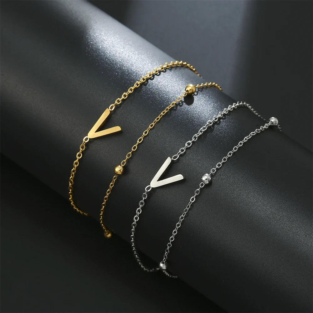 Armband mit doppelter Initiale in Gold und Silber  v