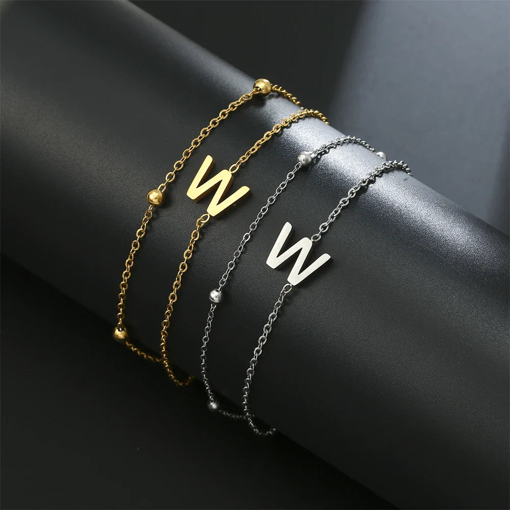 Armband mit doppelter Initiale in Gold und Silber  w