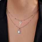 Doppelkette mit Schlüssel- und Vorhängeschloss-Anhänger in Silber