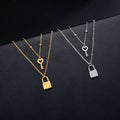 Doppelkette mit Schlüssel- und Vorhängeschloss-Anhänger in Gold
