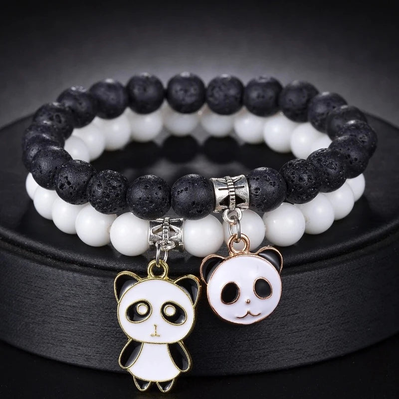 Duo aus weißen und schwarzen Panda-Armbändern