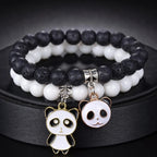 Duo aus weißen und schwarzen Panda-Armbändern