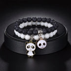 Duo aus weißen und schwarzen Panda-Armbändern