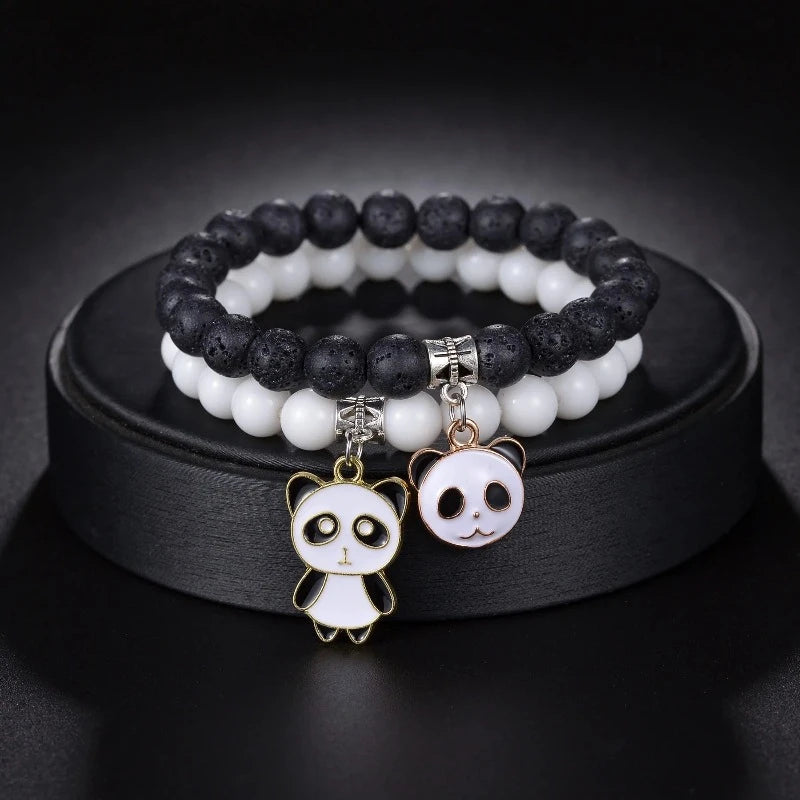 Duo aus weißen und schwarzen Panda-Armbändern