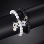 Duo aus weißen und schwarzen Panda-Armbändern