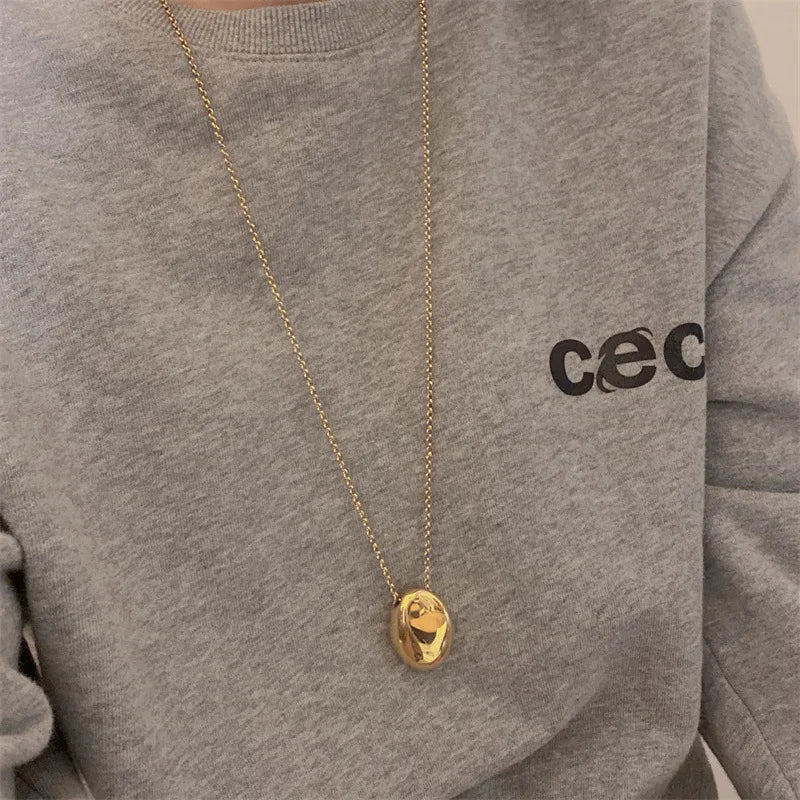 Lange Halskette Anhänger großer Wassertropfen gold