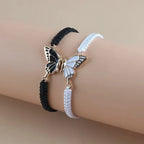 Set mit 2 Schmetterlingsflügel-Armbändern für beste Freunde in Schwarz und Weiß