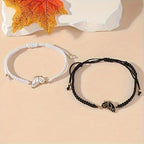 Set mit 2 Schmetterlingsflügel-Armbändern für beste Freunde in Schwarz und Weiß