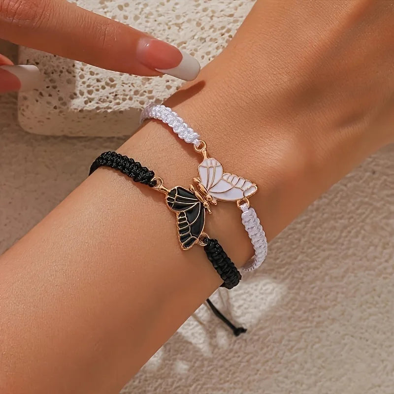 Set mit 2 Schmetterlingsflügel-Armbändern für beste Freunde in Schwarz und Weiß
